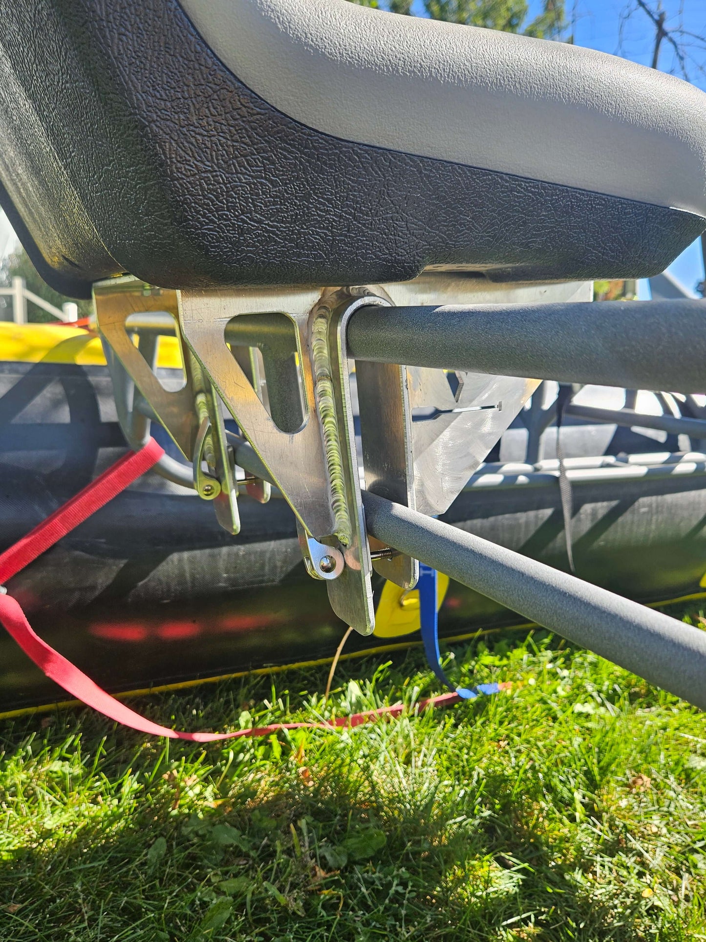Class V South Fork Cataraft Frame close-up showing the removable seat plate and adjustable oar towers.